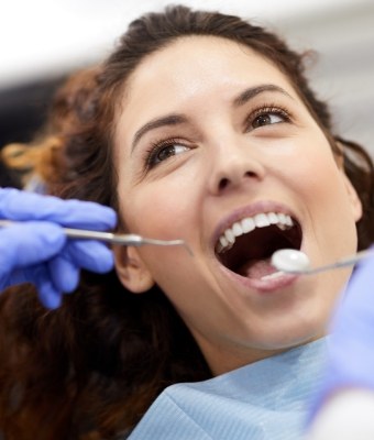 WOman smiling during dental exam