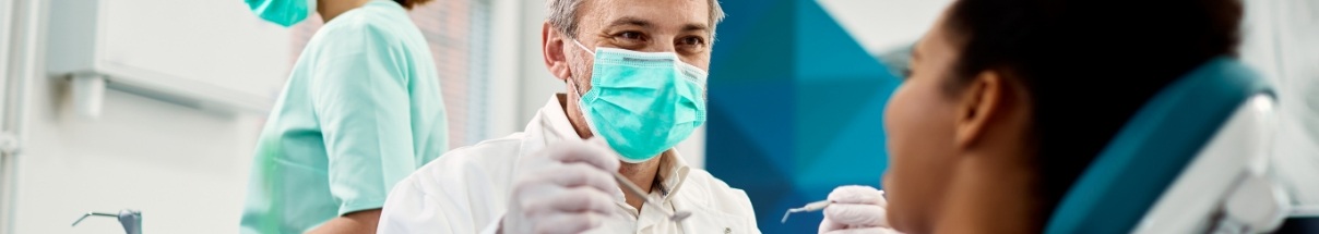 Claremore dentist about to perform a dental exam on a patient